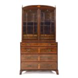 A Regency mahogany satinwood crossbanded and inlaid bookcase,