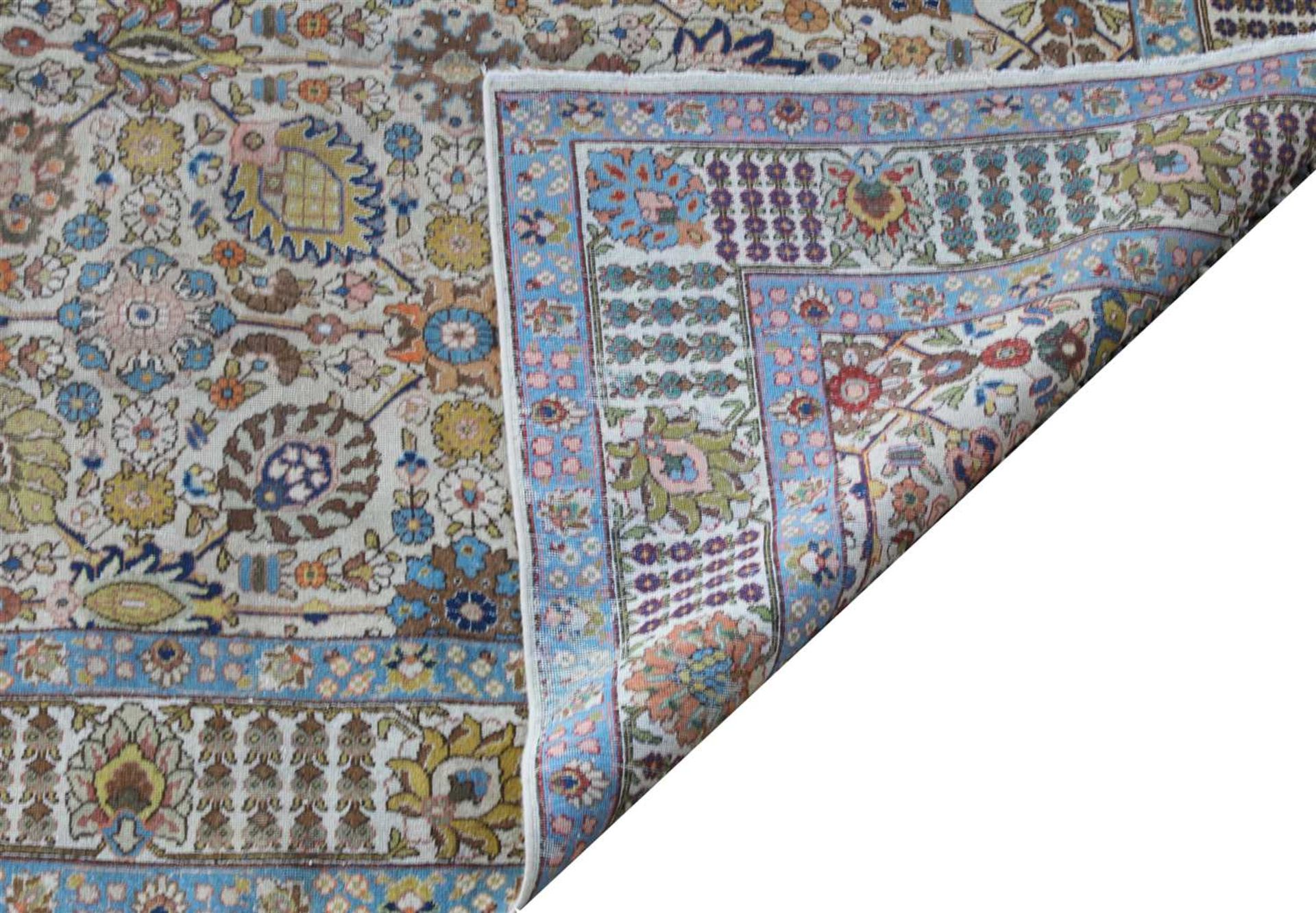A Persian Tabriz carpet, - Bild 2 aus 2