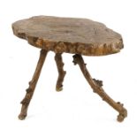 A rustic elm 'twig' table,