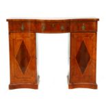 A George III-style inlaid mahogany serpentine front twin pedestal sideboard,