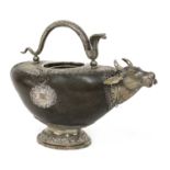 An Indian coco de mer and white metal water carrier (goumukhi),