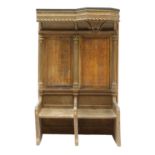 An oak two-seat pew,