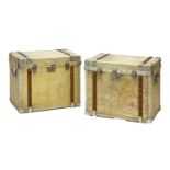 A pair of vellum and aluminium bound chests,