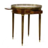 A French mahogany circular and gilt metal marble-topped occasional table,
