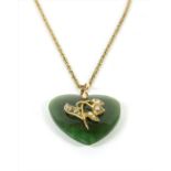 A nephrite jade and split pearl pendant,