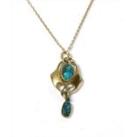 An Art Nouveau gold turquoise pendant,