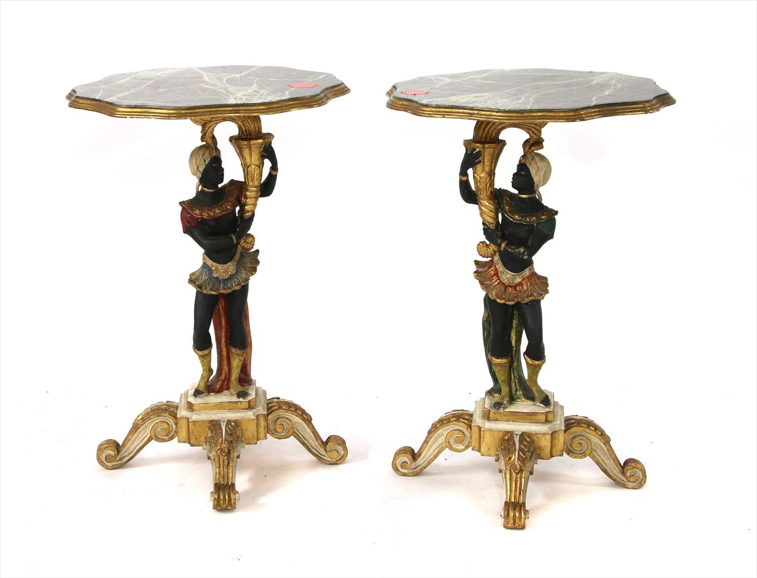 A pair of carved and painted blackamoor occasional tables,