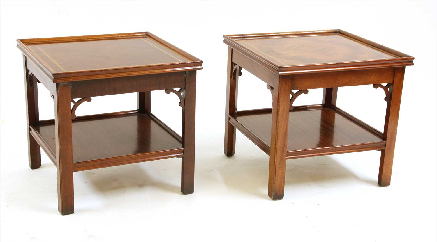 A pair of mahogany and inlaid two tier square occasional tables,