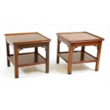 A pair of mahogany and inlaid two tier square occasional tables,