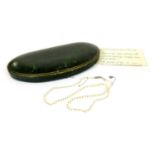 A cased single row graduated natural and cultured pearl necklace,