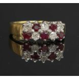 An 18ct gold two row ruby and diamond ring,