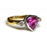 An 18ct yellow and white gold three stone pink sapphire and diamond ring,