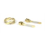 A pair of 18ct gold diamond earrings,