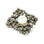 A silver and gold, pearl and diamond brooch,