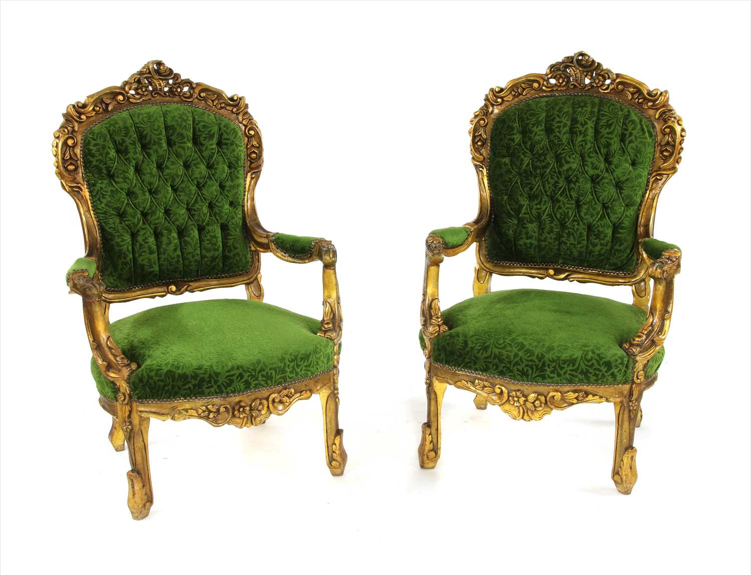 A pair of carved gilt painted armchairs,