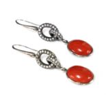 A pair of Continental white gold coral and diamond drop earrings,