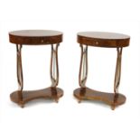 A pair of Italian walnut oval side tables,