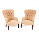 A pair of Victorian style spoonback armchairs,