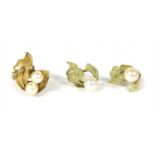 A gold cultured pearl ring and earrings suite, c.1970,