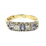 A 9ct gold tanzanite and diamond five stone ring,