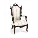 An Edwardian armchair,