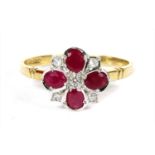 An 18ct gold ruby and diamond quatrefoil cluster ring,