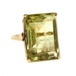 A gold single stone citrine ring,