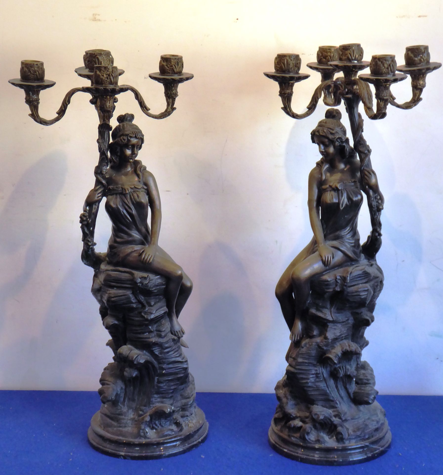 ADDED LOT A large and heavy opposing pair of bronze type metal five light figural candelabra