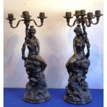 ADDED LOT A large and heavy opposing pair of bronze type metal five light figural candelabra