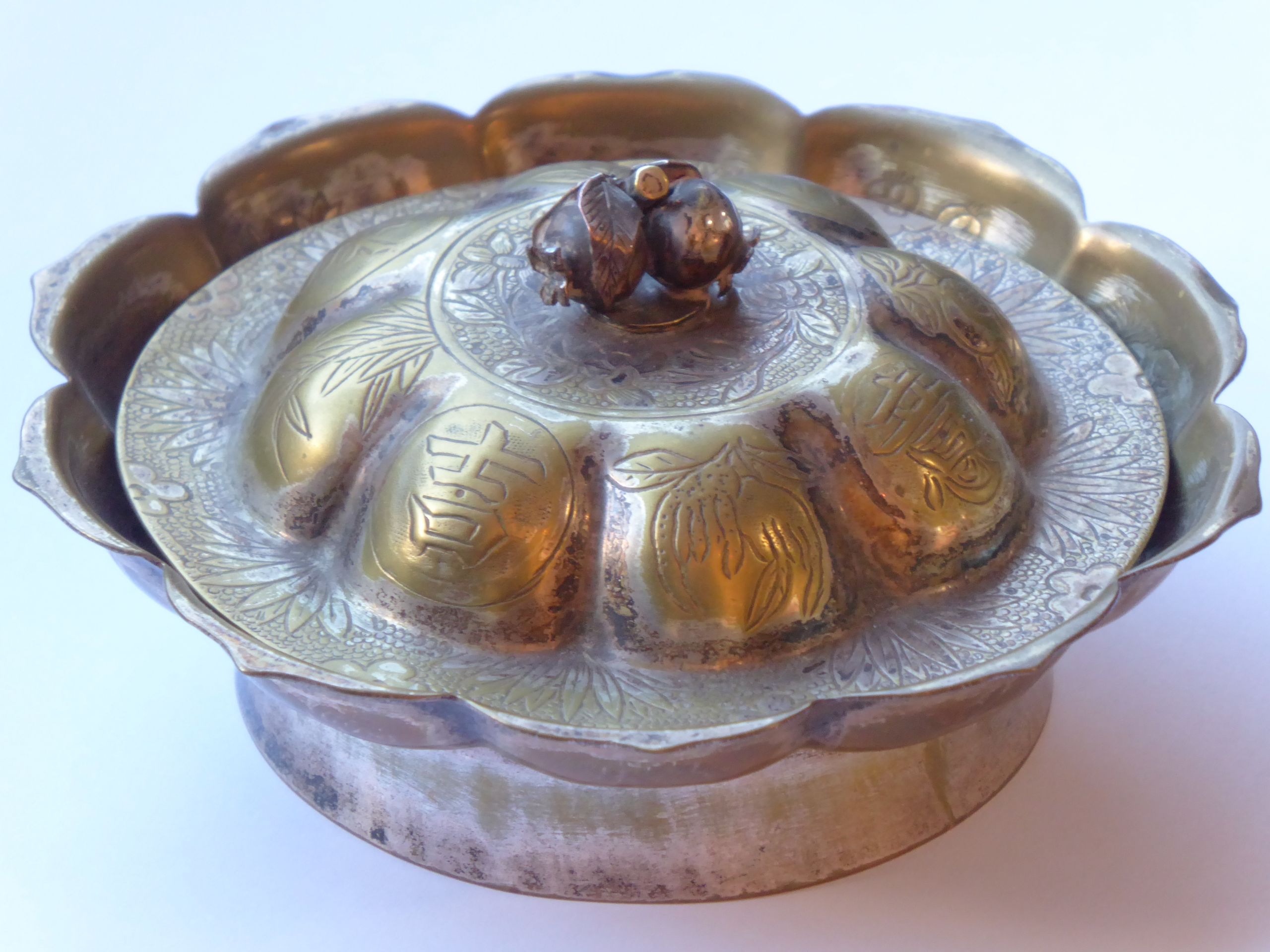 ADDED LOT A Chinese late 19th/early 20th Century silvered brass dish and cover,