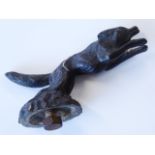 An early 20th century patinated bronze car mascot modelled as a leaping fox, 10.