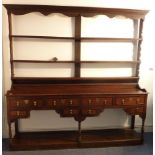 A large early-19th century oak dresser;