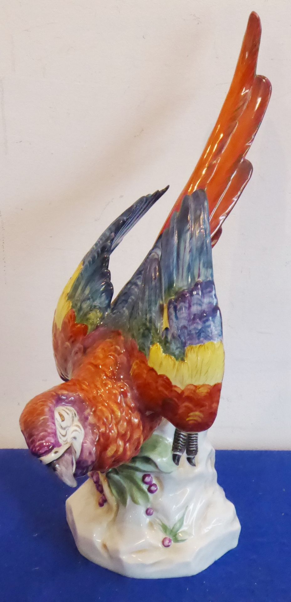 A late-19th / early-20th century German porcelain model of a parrot by the Unter Weiss Bach Factory,