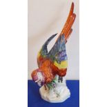 A late-19th / early-20th century German porcelain model of a parrot by the Unter Weiss Bach Factory,