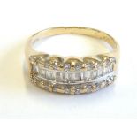 A gold half-eternity ring set with baguette and brilliant diamonds