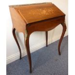 A 19th century French rosewood boxwood-strung and gilt-metal- mounted bureau-de-dame;