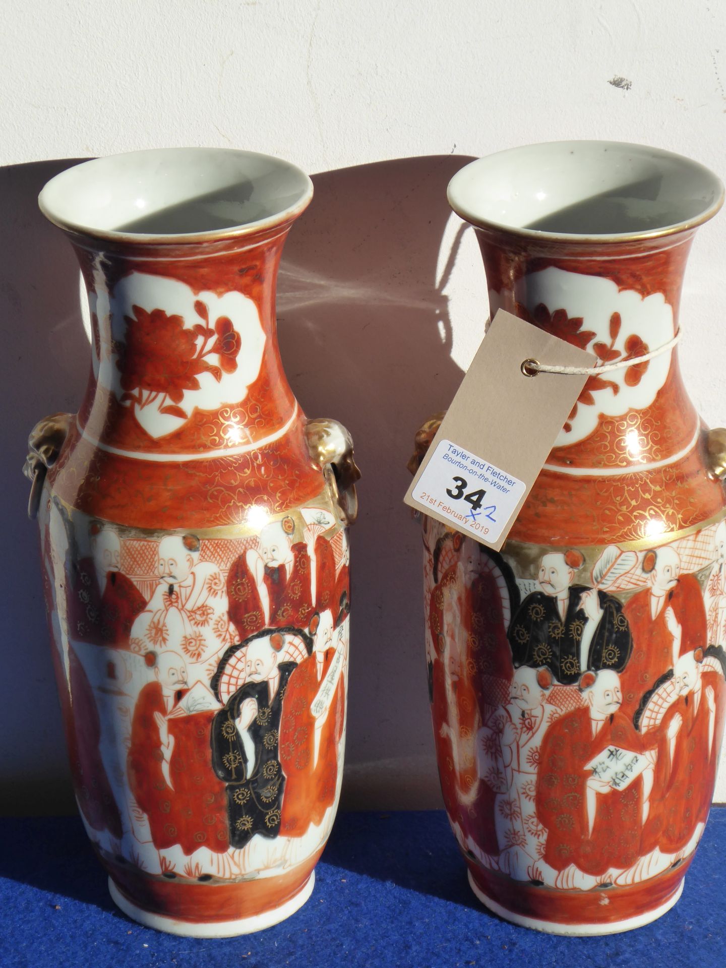 A pair of late 19th/early 20th century Japanese Kutani porcelain vases typically gilded and