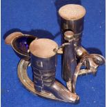 An early 20th century Elkington & Co novelty silver-plated cruet set modelled as a jockey's cap and