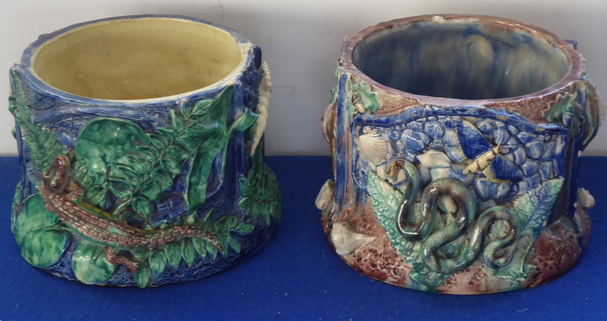 Two 19th century majolica circular pots in the style of Bernard Palissy;