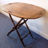 A Georgian mahogany tray with hinged,