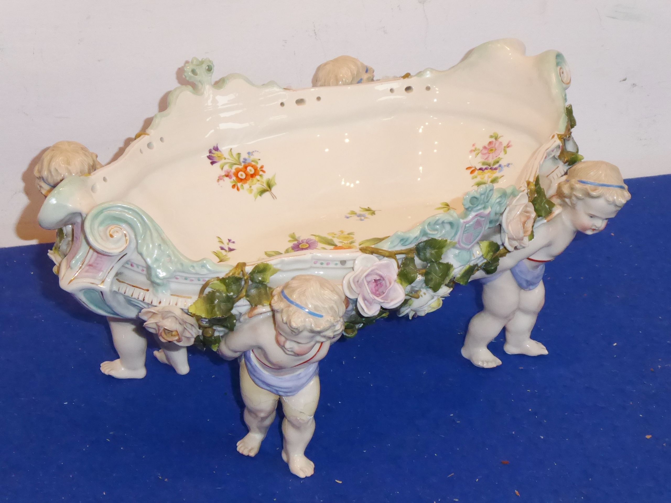 A large late-19th / early-20th century German porcelain boat-shaped dish;