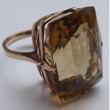 A yellow metal ring claw-set with a single rectangular citrine, total weight approx. 6.