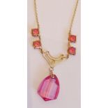 A 9-carat gold necklace set with pink topaz stones