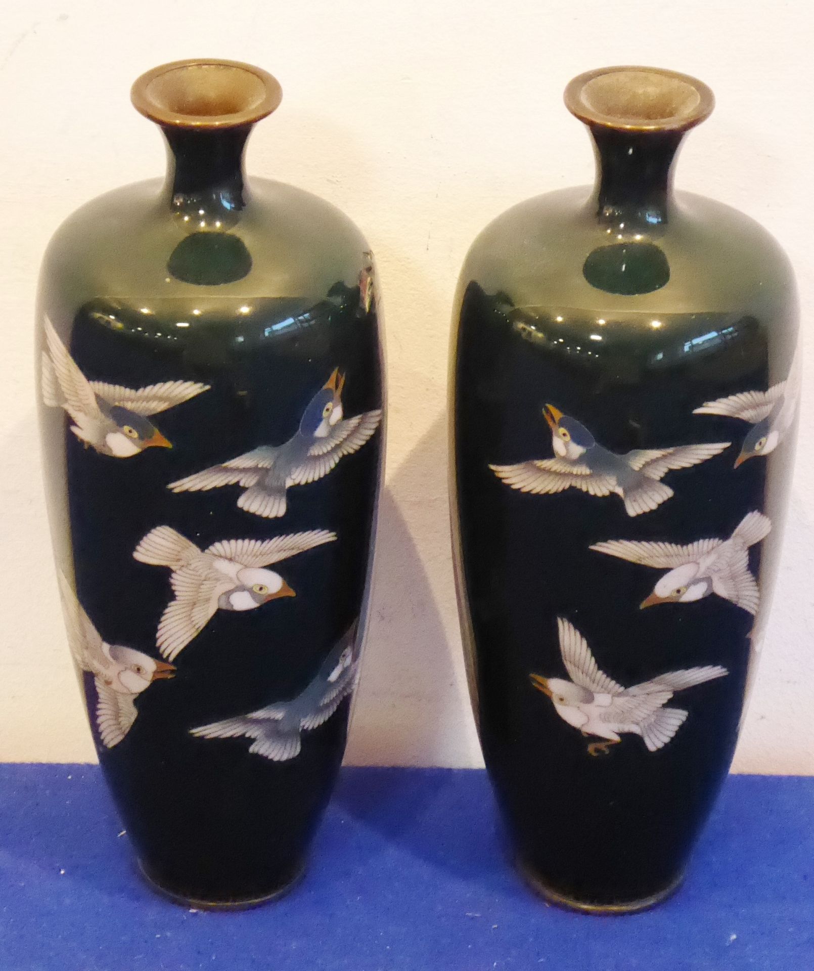 A pair of early 20th century Japanese Meiji period opposing cloisonné vases,