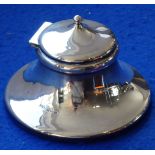 A hallmarked silver circular silver capstan inkwell; early 20th century,