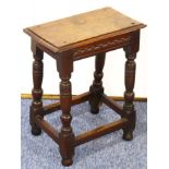 A 17th century oak joint stool;