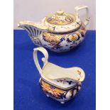 A large early-19th century Derby porcelain teapot hand-gilded and decorated in the Imari palette