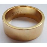 A Continental yellow metal wedding band; inscription and date engraved to inside of ring, approx. 7.