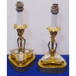 A pair of gilt-metal and silver-plated candlestick-style table lamps;