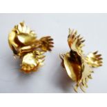 A pair of Continental yellow-metal earrings modelled as birds on the wing, approx. 20.